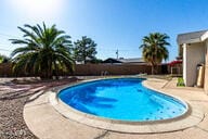 view of swimming pool featuring a patio