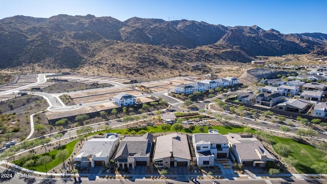 drone / aerial view featuring a mountain view