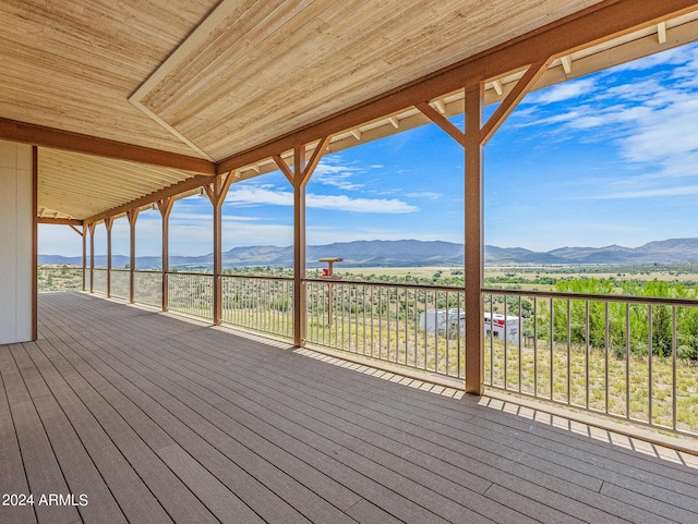 wooden terrace with a mountain view