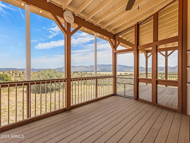 wooden terrace with a mountain view