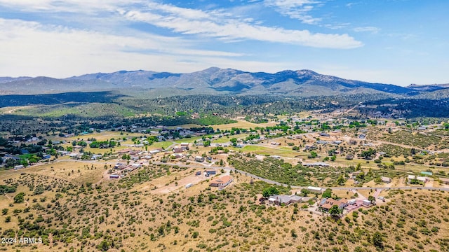 birds eye view of property featuring a mountain view