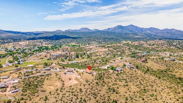 drone / aerial view featuring a mountain view