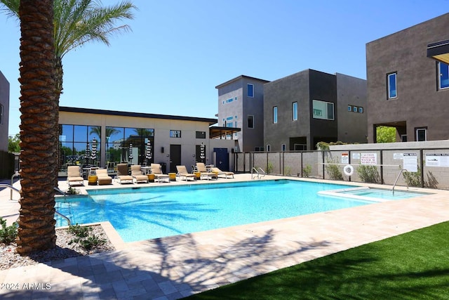 view of swimming pool featuring a patio