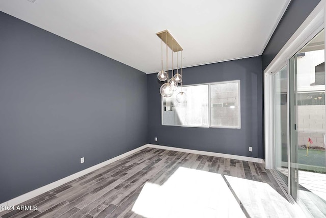 unfurnished room featuring wood-type flooring