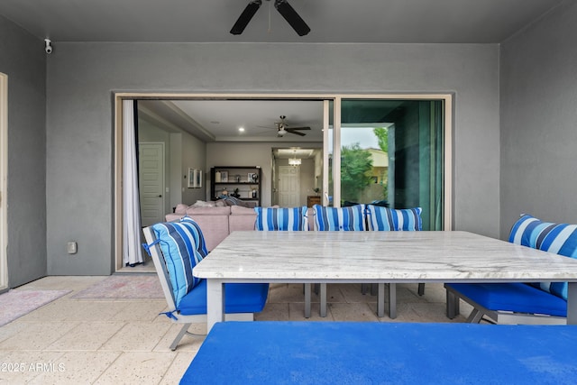 dining space with ceiling fan