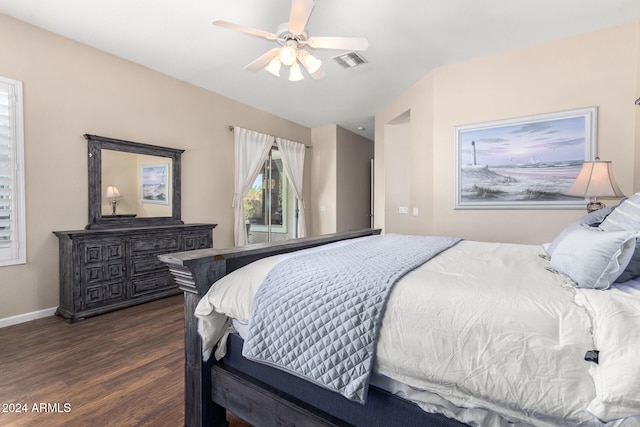 bedroom with dark wood-type flooring and ceiling fan