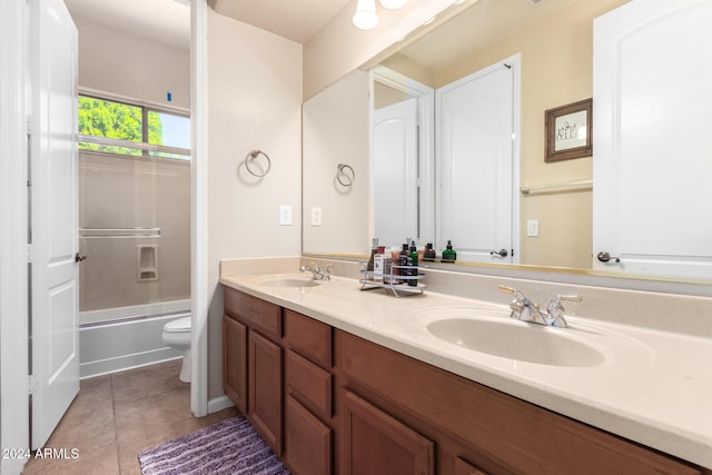 full bathroom featuring vanity, toilet, enclosed tub / shower combo, and tile patterned flooring