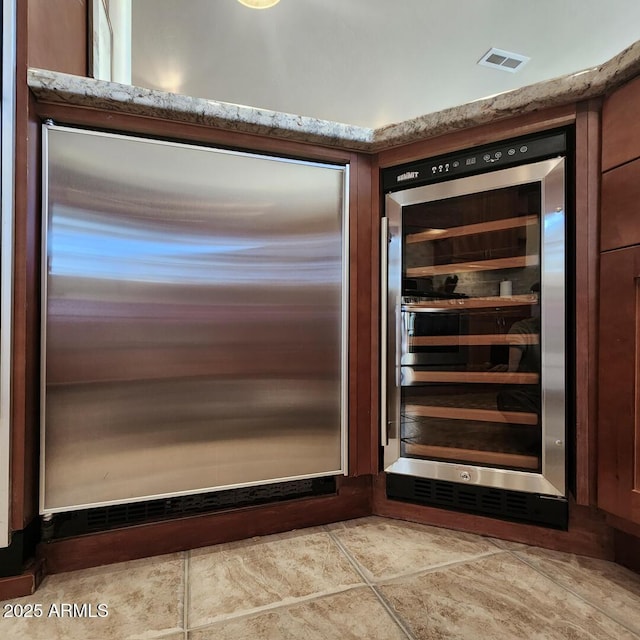 details with wine cooler and visible vents