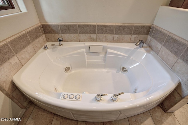 full bath featuring a jetted tub