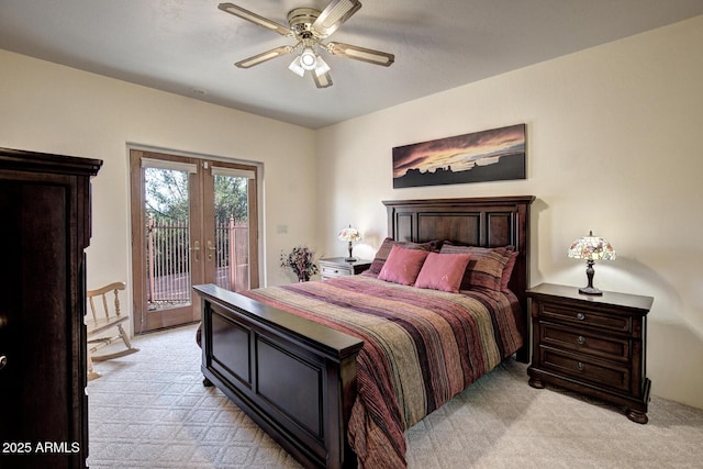 bedroom with ceiling fan, access to outside, french doors, and light carpet