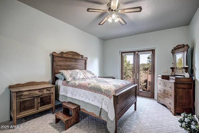 bedroom featuring light carpet, a textured ceiling, a ceiling fan, and access to outside