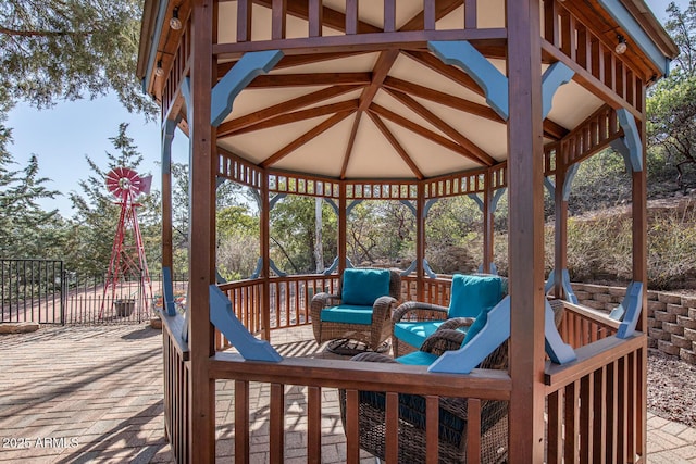 wooden deck featuring a gazebo