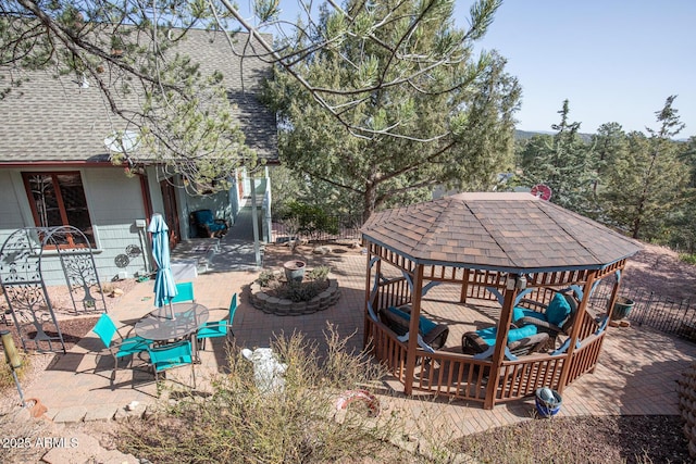 view of yard featuring a gazebo and a patio area