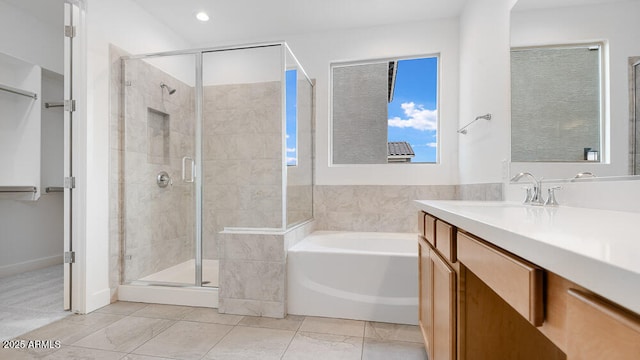 17841 W Windsor Blvd, Litchfield Park, AZ 85340 - bathroom with a shower stall, a garden tub, vanity, and recessed lighting