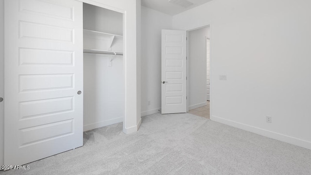 17841 W Windsor Blvd, Litchfield Park, AZ 85340 - unfurnished bedroom with carpet floors, baseboards, and a closet