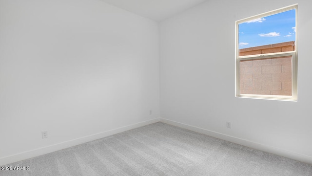 17841 W Windsor Blvd, Litchfield Park, AZ 85340 - empty room featuring carpet floors and baseboards
