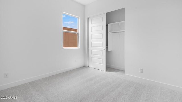 17841 W Windsor Blvd, Litchfield Park, AZ 85340 - unfurnished bedroom with carpet, a closet, and baseboards