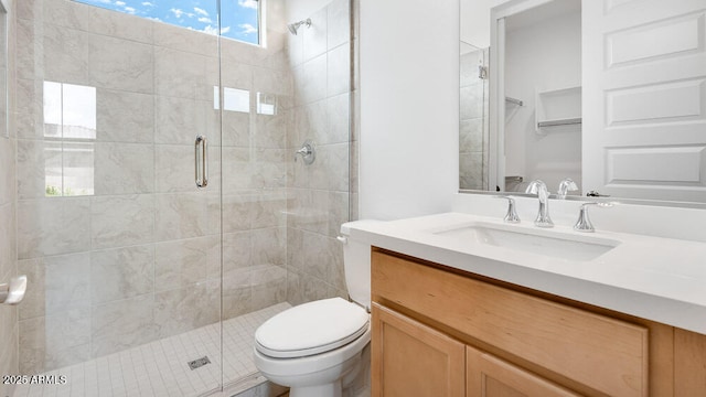 17841 W Windsor Blvd, Litchfield Park, AZ 85340 - bathroom featuring a shower stall, toilet, and vanity