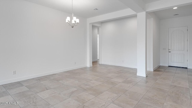 17841 W Windsor Blvd, Litchfield Park, AZ 85340 - spare room featuring a chandelier, baseboards, and recessed lighting