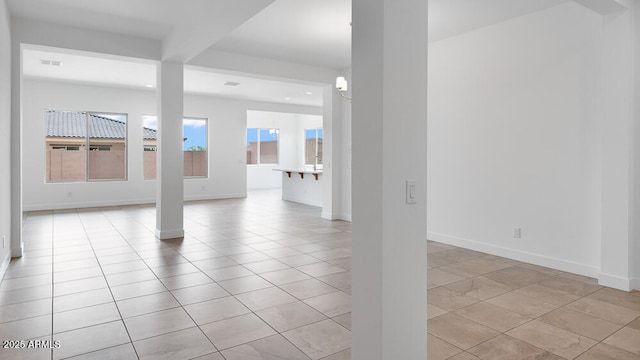 17841 W Windsor Blvd, Litchfield Park, AZ 85340 - unfurnished room with recessed lighting, baseboards, and light tile patterned floors