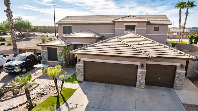 view of front of property featuring a garage