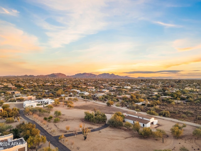 aerial view at dusk with a mountain view