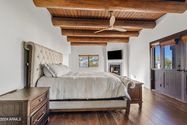 bedroom with wooden ceiling, multiple windows, and dark wood-style floors