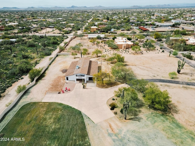 drone / aerial view featuring a mountain view