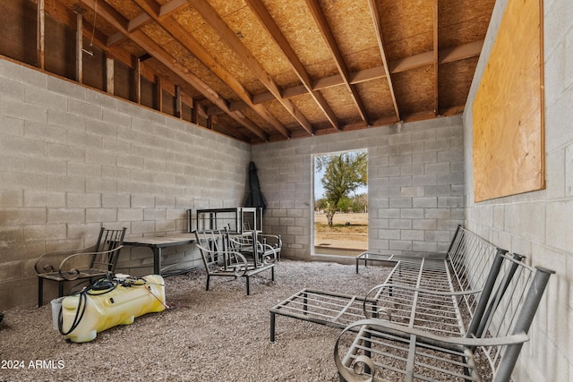 interior space featuring concrete block wall