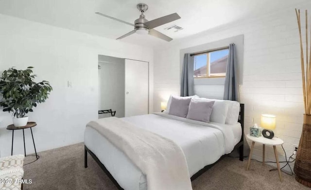 3330 E Cypress St, Phoenix, AZ 85008 - bedroom featuring carpet, a closet, and a ceiling fan