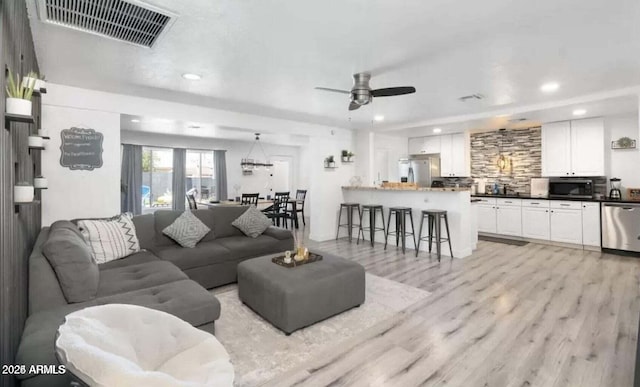 3330 E Cypress St, Phoenix, AZ 85008 - living area with recessed lighting, light wood-style flooring, and ceiling fan