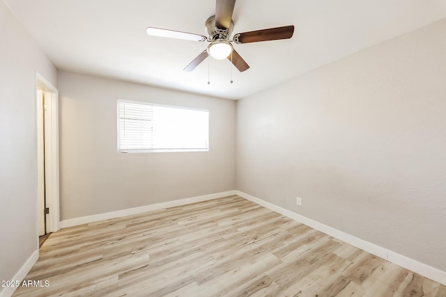 3238 W Rose Ln, Phoenix, AZ 85017 - empty room with wood finished floors and ceiling fan