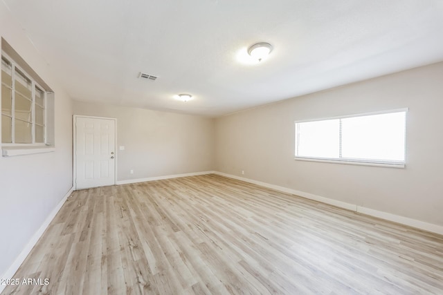 3238 W Rose Ln, Phoenix, AZ 85017 - spare room with wood finished floors and baseboards