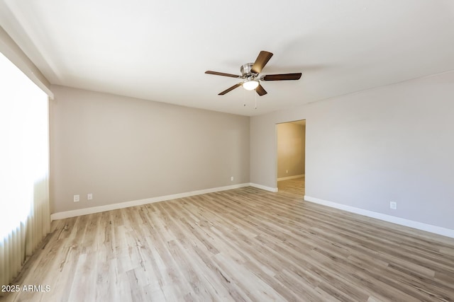 3238 W Rose Ln, Phoenix, AZ 85017 - empty room featuring a ceiling fan and light wood-style floors