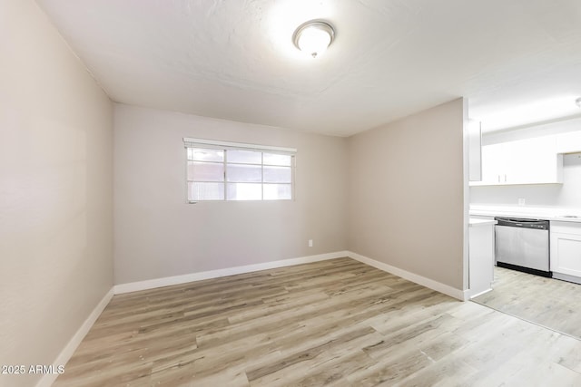 3238 W Rose Ln, Phoenix, AZ 85017 - unfurnished room with light wood-style floors and baseboards