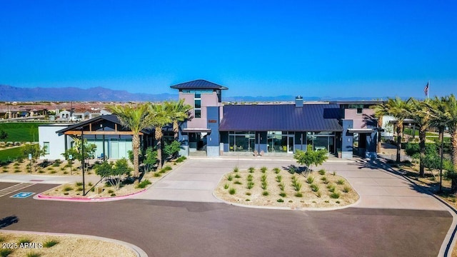 view of building exterior with a mountain view