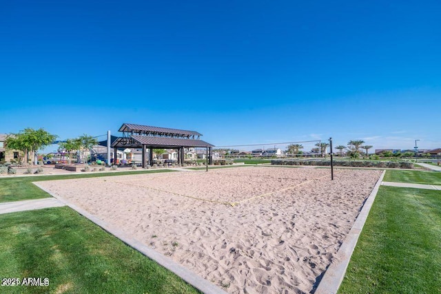 view of home's community featuring a gazebo, a lawn, and volleyball court