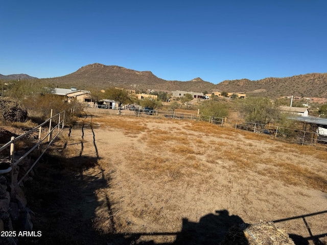 mountain view featuring a rural view