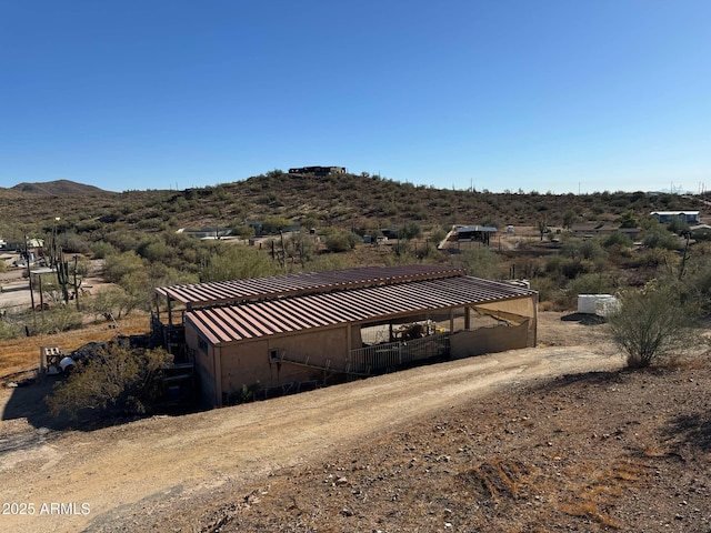 property view of mountains featuring a rural view