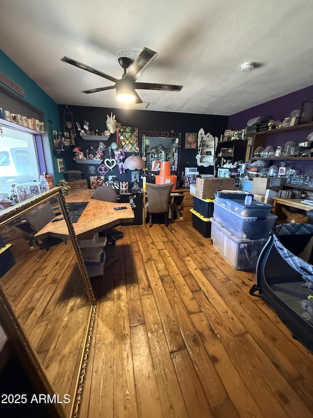 miscellaneous room with ceiling fan and hardwood / wood-style floors