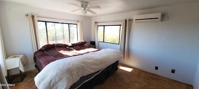 carpeted bedroom with an AC wall unit and ceiling fan