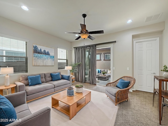 14572 W Medlock Dr, Litchfield Park, AZ 85340 - living room featuring light carpet, a ceiling fan, and recessed lighting