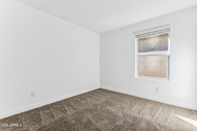 empty room featuring carpet flooring