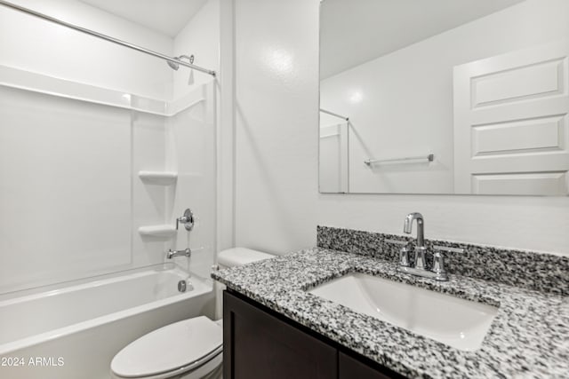 full bathroom with vanity, shower / bathtub combination, and toilet