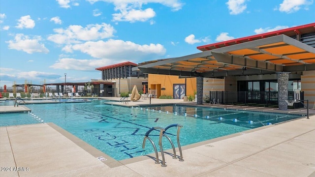 view of swimming pool with a patio area