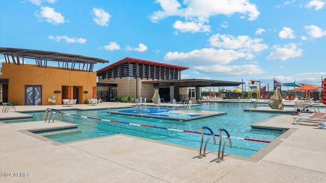 view of swimming pool featuring a patio