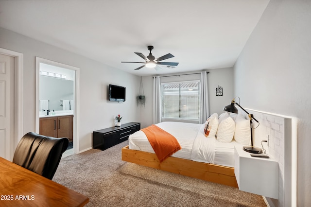 carpeted bedroom featuring connected bathroom and ceiling fan