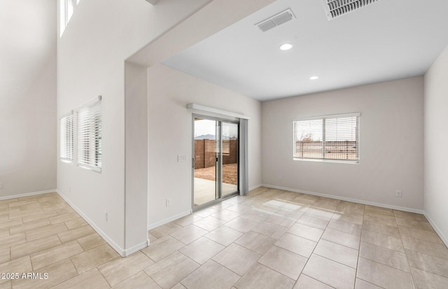 17857 W Getty Dr, Goodyear, AZ 85338 - empty room with light tile patterned flooring