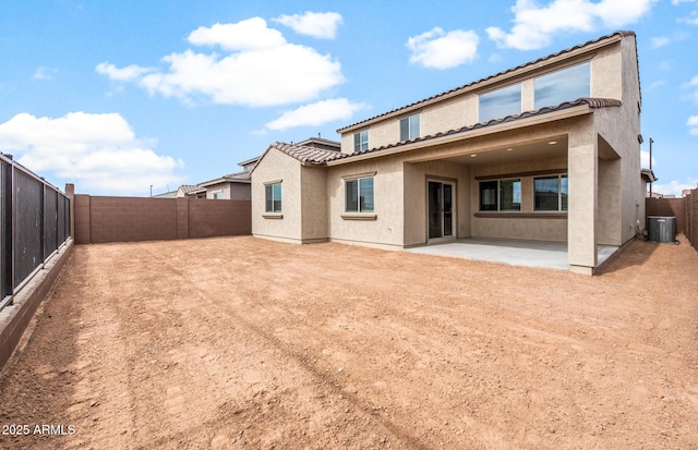 17857 W Getty Dr, Goodyear, AZ 85338 - back of property featuring central AC and a patio area