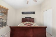 bedroom featuring ceiling fan